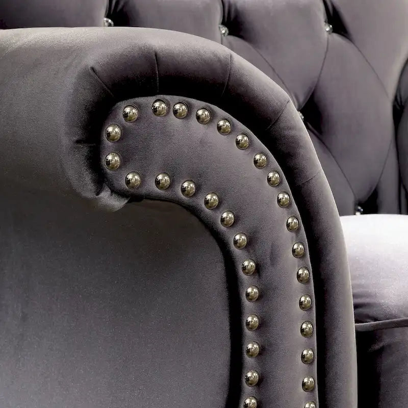 Fauteuil capitonné en tissu traditionnel avec boutons